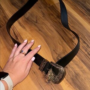 Elegant Black Leather Belt with Ornate Buckle